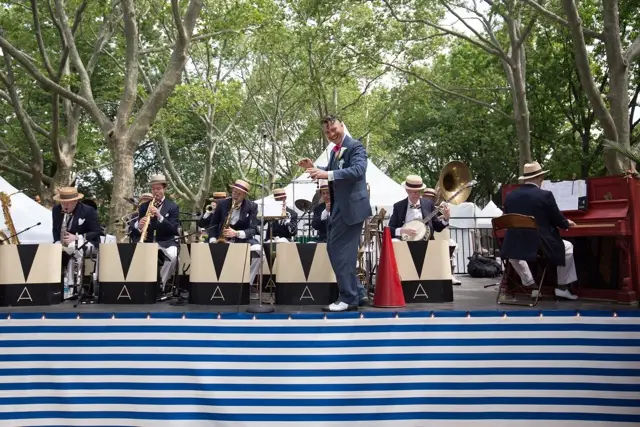 Michael Arenella, conducting, has yet to compensate workers he employed at his August 2016 Jazz Age Lawn Party (Sai Mokhtari/Gothamist).